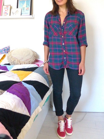 Pairing a plaid shirt and skinny jeans