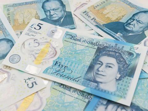 The new five-pound note containing animal fat